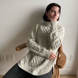 Wind River turtle neck knit sweater